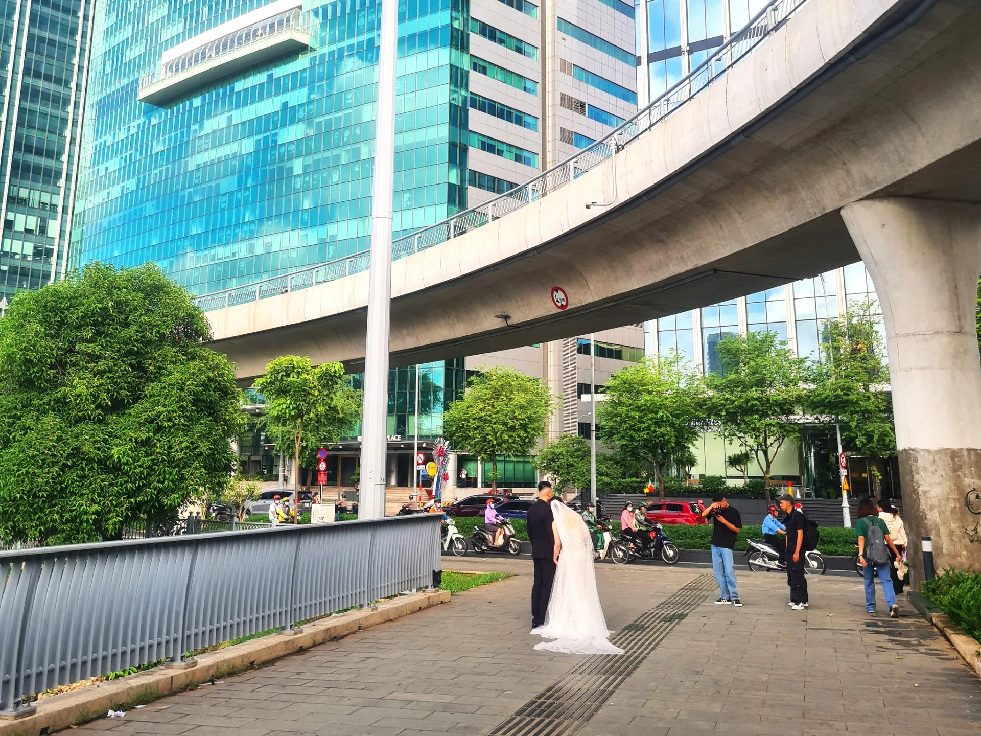  A wedding couple on a photo shoot in the business district in Ho Chi Minh City, a popular holiday destination in Vietnam 
