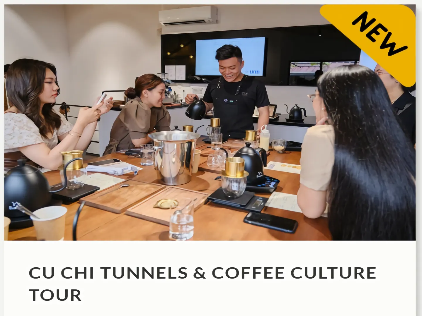 Tourists participating in a coffee making experience during a cruise tour of Cu Chi Tunnels near Ho Chi Minh City, a popular holiday destination in Vietnam