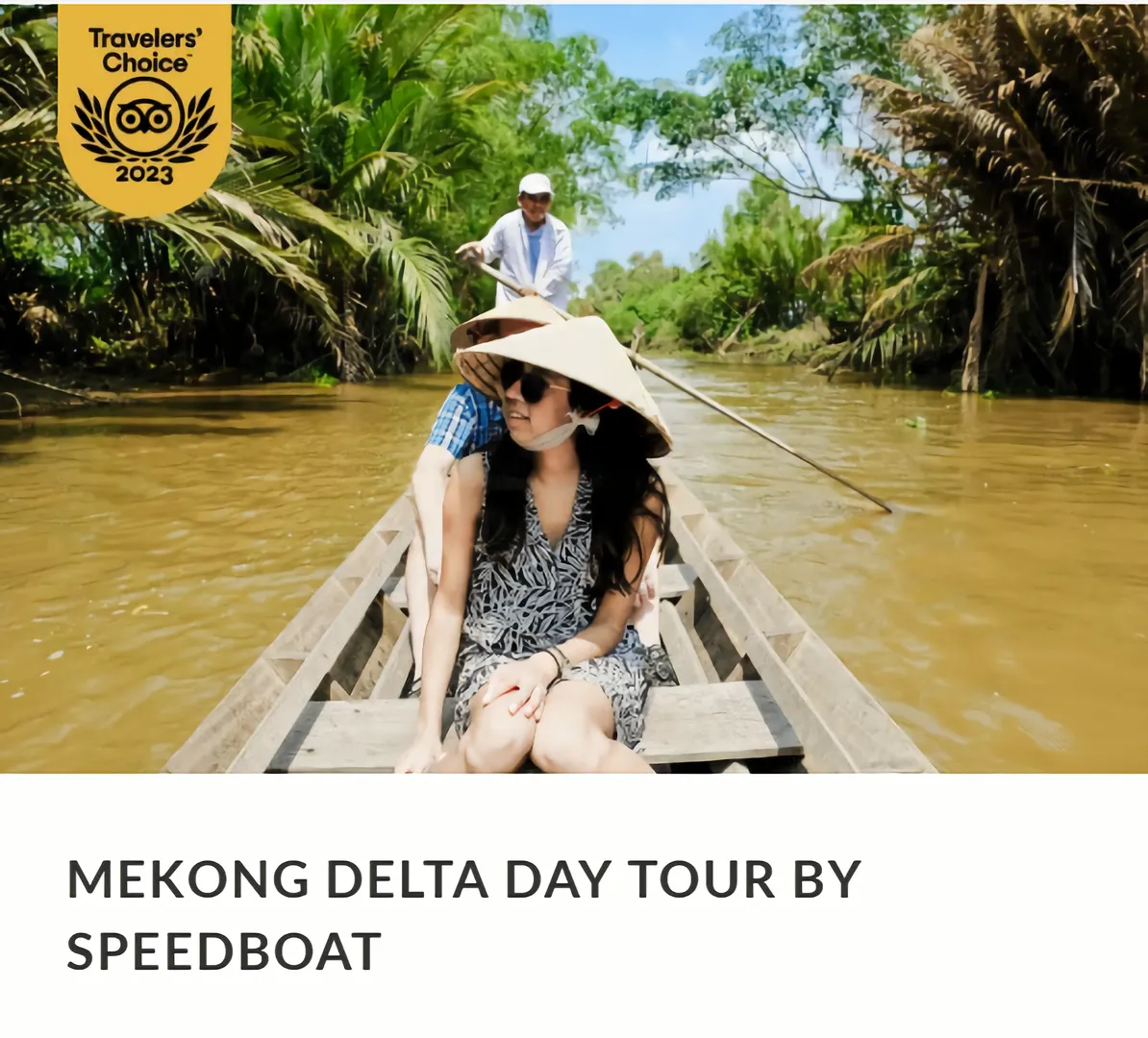 Tourists on a traditional Vietnamese boat during a cruise tour Mekong Delta near Ho Chi Minh City, a popular holiday destination in Vietnam