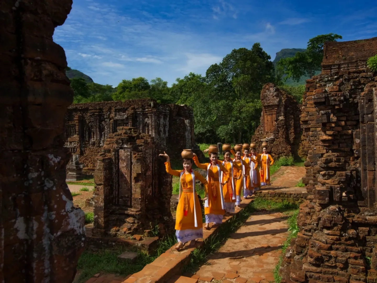  Hills covered with tropical flora and blue water on Cham Island off Hoi An, a popular holiday destination in Vietnam 