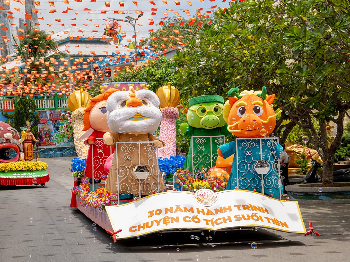  Kids-friendly mascots ona float during a street parade in Suoi Tien theme park located in Ho Chi Minh City, a popular holiday destination in Vietnam 