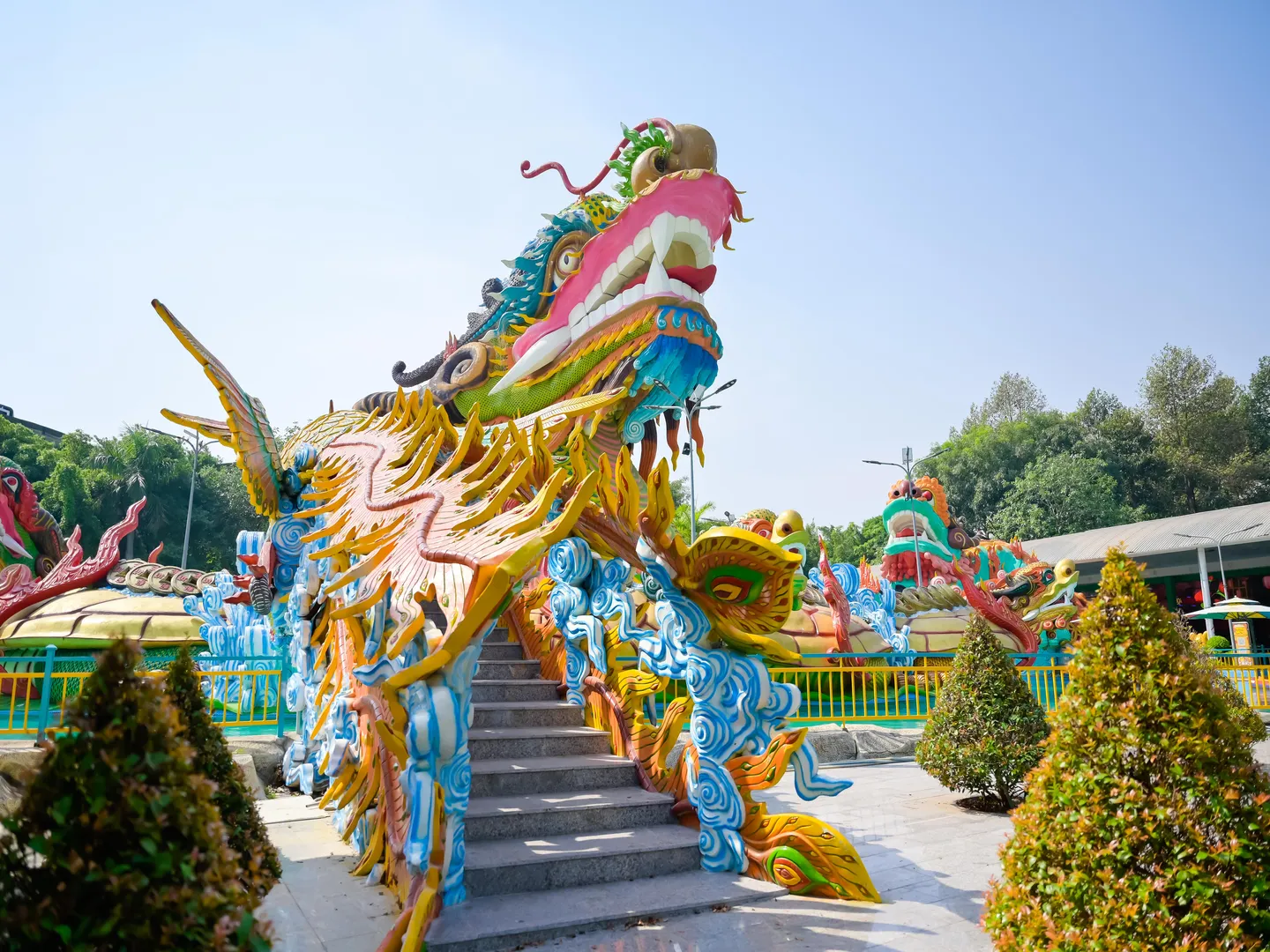  Image of a giant mythical dragon installation in Suoi Tien theme park located in Ho Chi Minh City, a popular holiday destination in Vietnam 