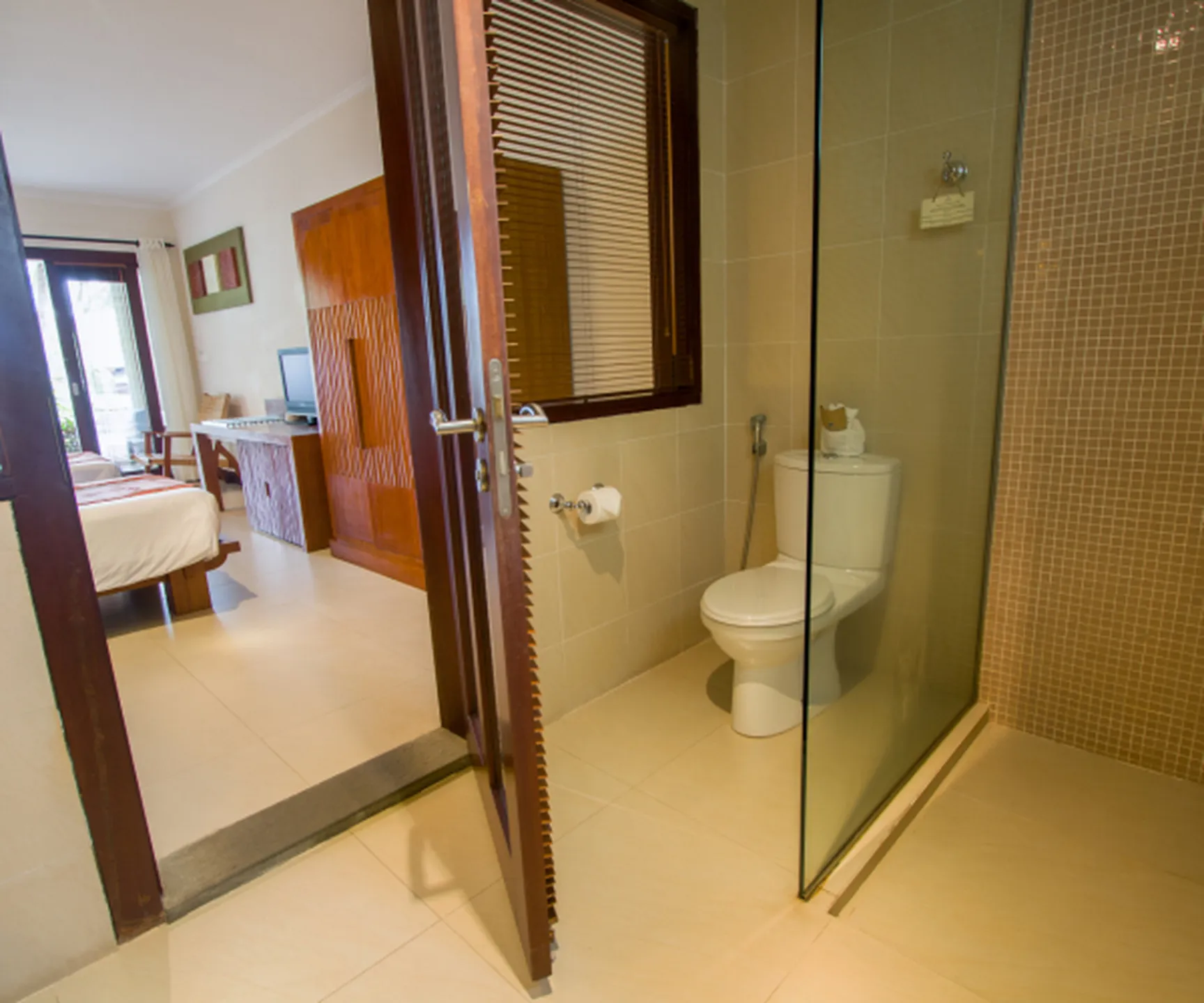  private bathroom with walk in shower in pool view bungalow Mui Ne beach resort Vietnam 
