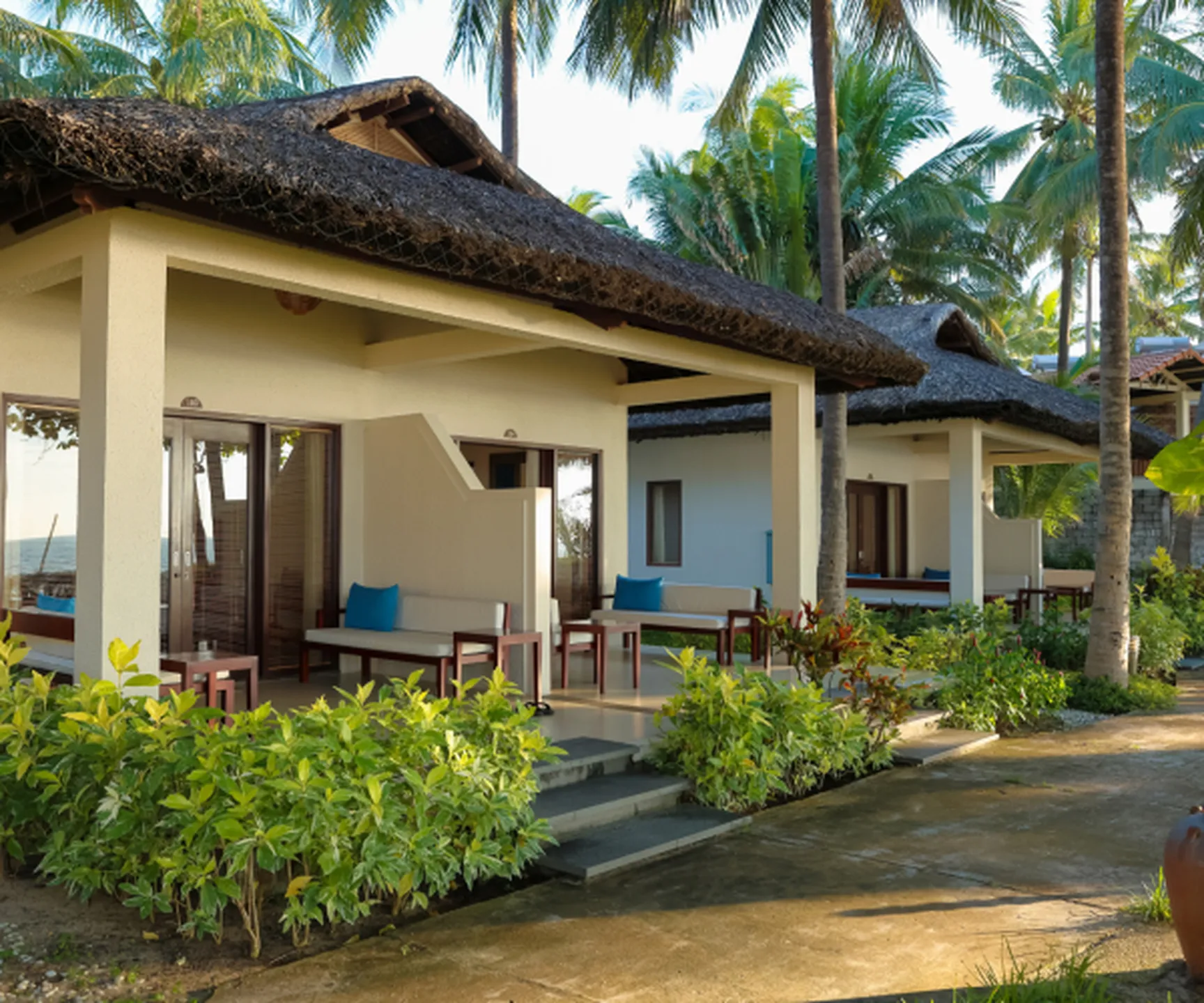  Sea view bungalow terrace overlooking beach and ocean at Blue Ocean Resort Mui Ne Vietnam 