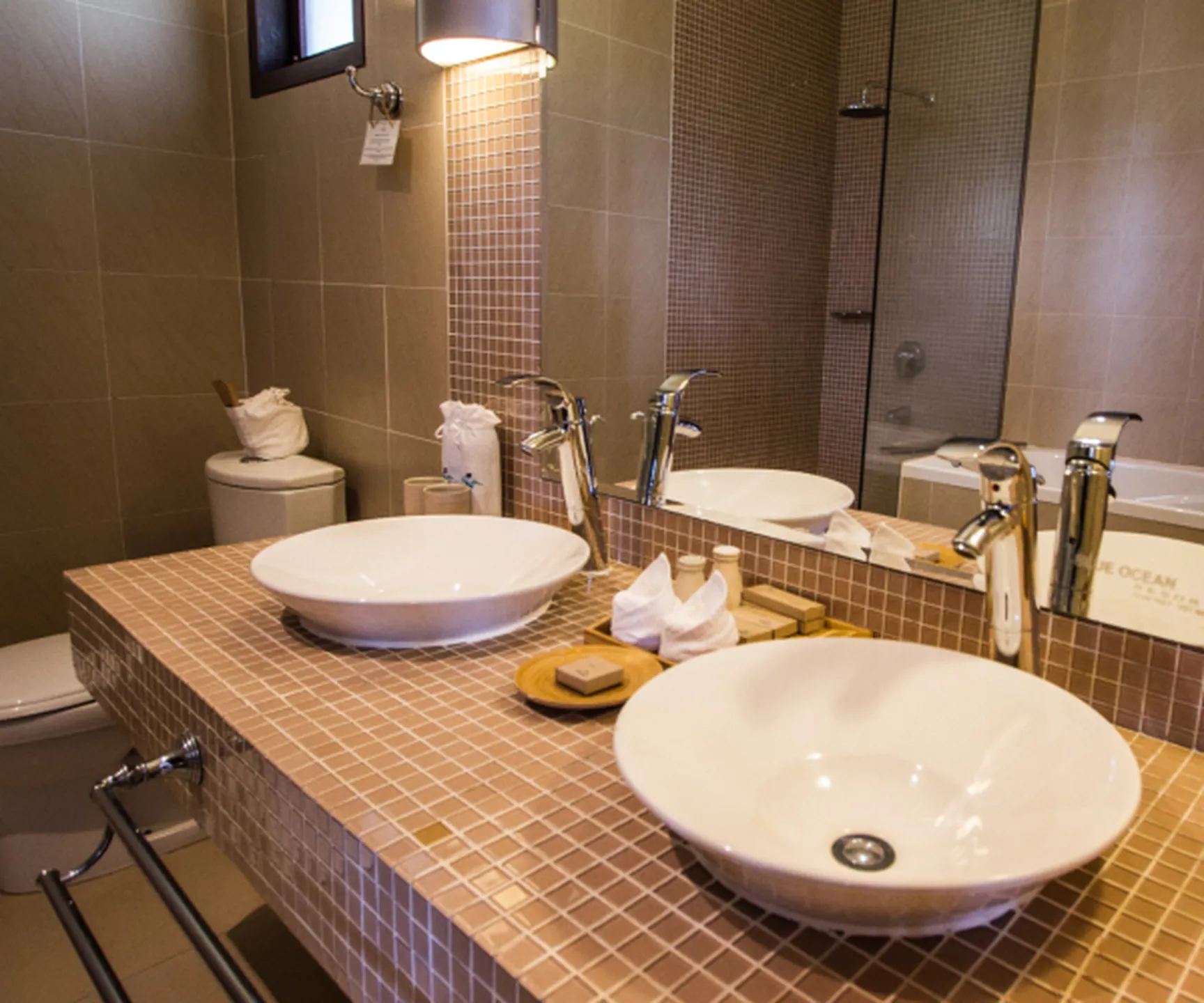  Modern bathroom with double vanity sinks in sea view family bungalow at Blue Ocean Resort Mui Ne Vietnam 