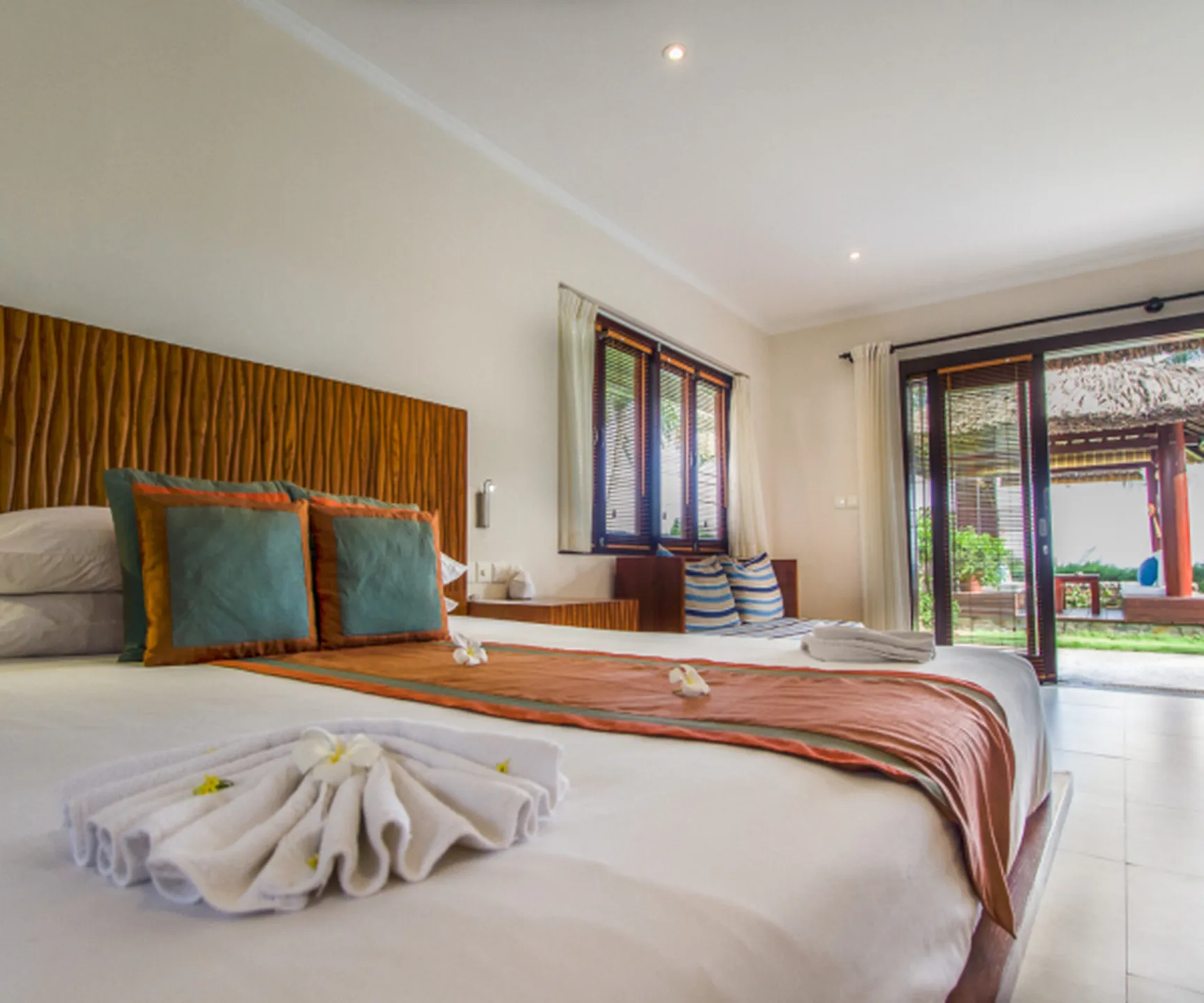  Spacious bedroom with king bed in sea view family bungalow at Blue Ocean Resort Mui Ne Vietnam 