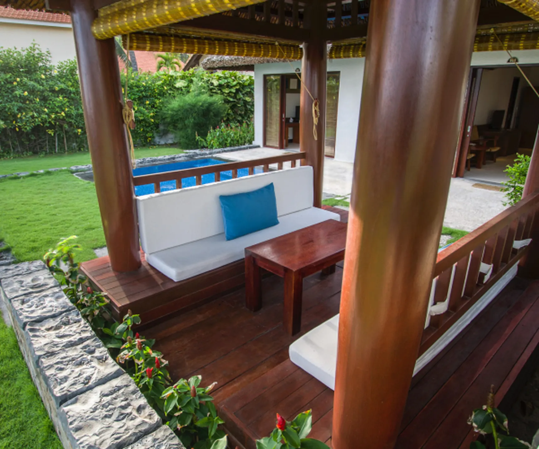  Outdoor seating pavilion at sea view family bungalow in Blue Ocean Resort Mui Ne with garden and pool views 